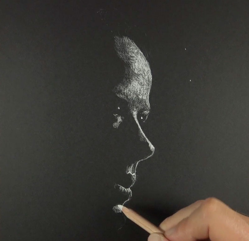 Drawing in the highlights with white charcoal